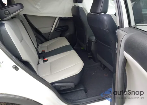 2016 Toyota Rav4 Limited z USA, uszkodzony, nr VIN 2T3YFREV6GW293418